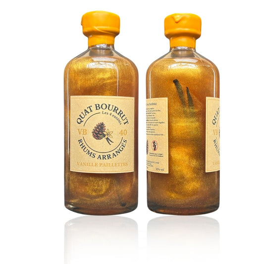 Bouteille artisanale de rhum arrangé à la vanille et au paillettes d'or, Quat Bourrut, fabriqué dans les Landes.